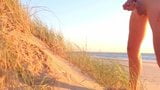 Boy wanks in The dunes of the beach snapshot 7