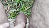 Peeing outdoors on the grass snapshot 8