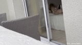 Hot spanish girl was secretly filmed in her hotel room through the window while she was taking some nude photes. snapshot 15