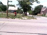 Detroit skinny black Street hooker in red tight mini dress. snapshot 4