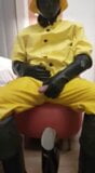 yellow rain gear and rubber boots snapshot 3