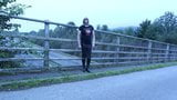 crossdressed outdoors on a motorway bridge snapshot 3