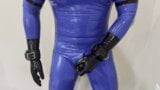 Shiny blue rubber gimp cumshot snapshot 3