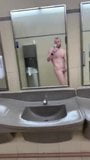 Nervous boy gets naked in public bathroom snapshot 4