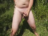 Naked guy ejaculating outdoor with dildo up his asshole. snapshot 4