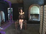 Sexy brunette in see-thru, trussed up like a turkey for a BDSM session snapshot 1