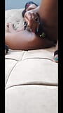 Muñeca sexual cachonda masturbándose solo en el sofá con berenjena snapshot 11