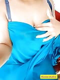 Big boobs desi shruti bhabhi teasing in her blue saree snapshot 8