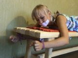 girl tied to table snapshot 7