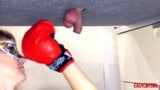 A brave girl smashes balls in the new Ballbusting boxing vid snapshot 4