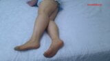 Anna is on the bed, showing off in pantyhose. snapshot 5