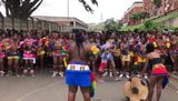 Topless African girls group dance on the street snapshot 1