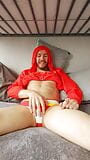 Jerking off a hard cock in a red jacket snapshot 1