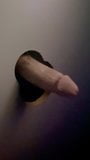 MWM wags big dick through adult book store glory hole snapshot 4