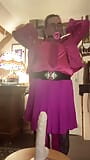 In fuchsia flight attendant's outfit for one evening with a mouth retractor snapshot 2