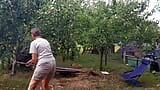 Hot housewife Lukerya in the garden with a rake cleans in the pose of a dog snapshot 1