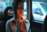 Lady Smokes in Car with Windows Up snapshot 7