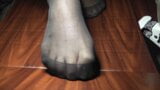 Pantyhose feet play with balls snapshot 2