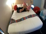 Crossdresser con medias y lencería en un hotel snapshot 12