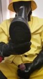 yellow rain gear and rubber boots snapshot 9