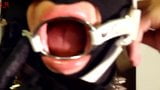 Putting hand made ring gag harness in slave slut mouth snapshot 3