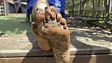 Muddy Soles - playing with mud between my toes in my back garden snapshot 5