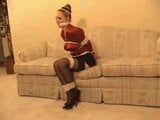 NEWSGIRL STRUGGLING ON A COUCH snapshot 3