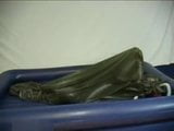 Woman struggling in a green latex bag snapshot 20