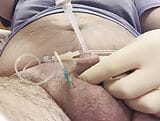 Inserting a large catheter into a small cock with big balls snapshot 6