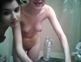 2 hot girls showering together snapshot 13
