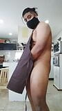 A young man posing in the kitchen. snapshot 3